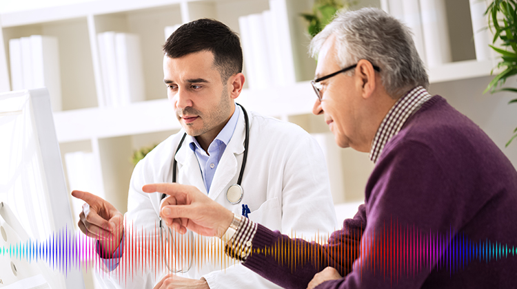 Doctor communicating with patient in person