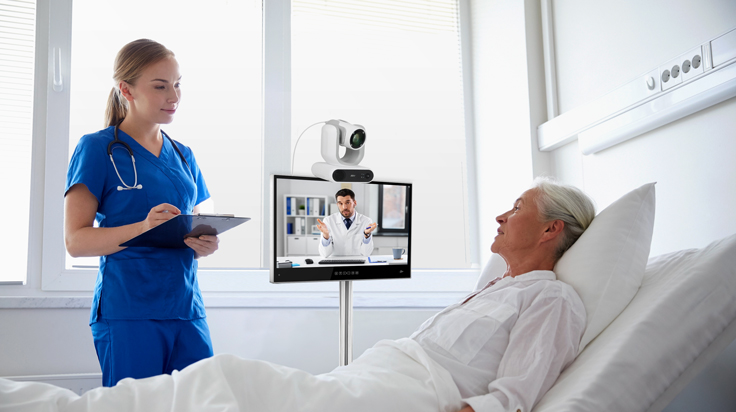Male patient in conference call with doctor, who is treating his stroke condition.